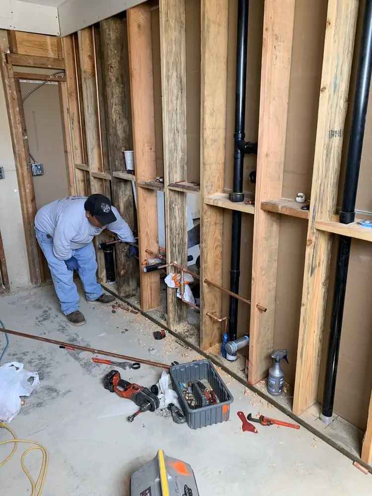 Commercial rough-in plumbing for Water Heater Replacement in Lewis Estates